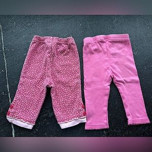 2/$10 - 2 pair Pink Baby pants:
-Gerber Size: 0-3 months 
-Carters Size: Newborn
